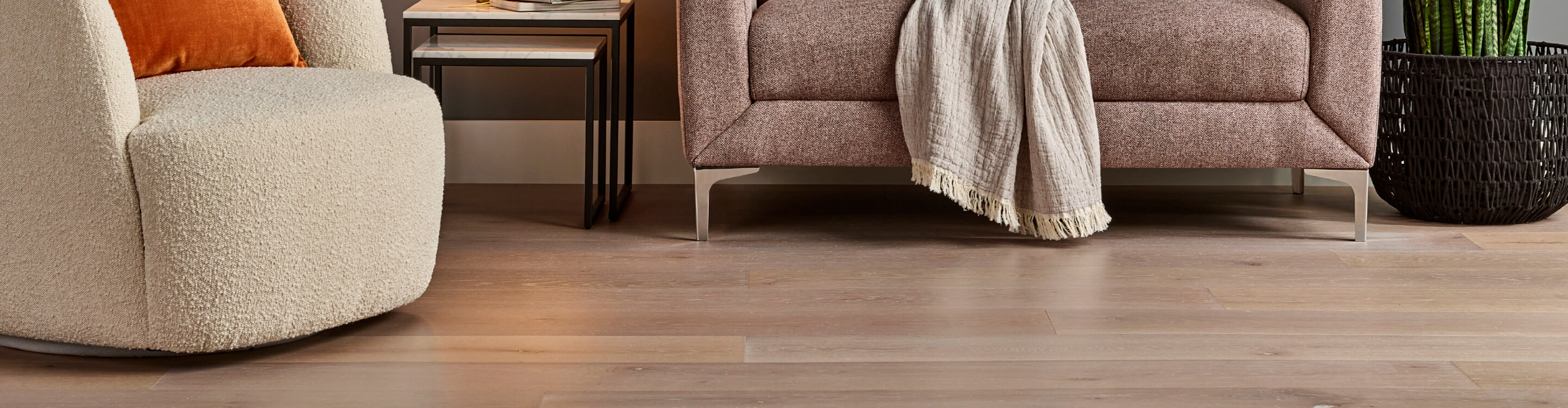 Wood-look vinyl flooring under furniture.